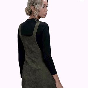 Sage green corduroy jumper with gold zipper and front pockets